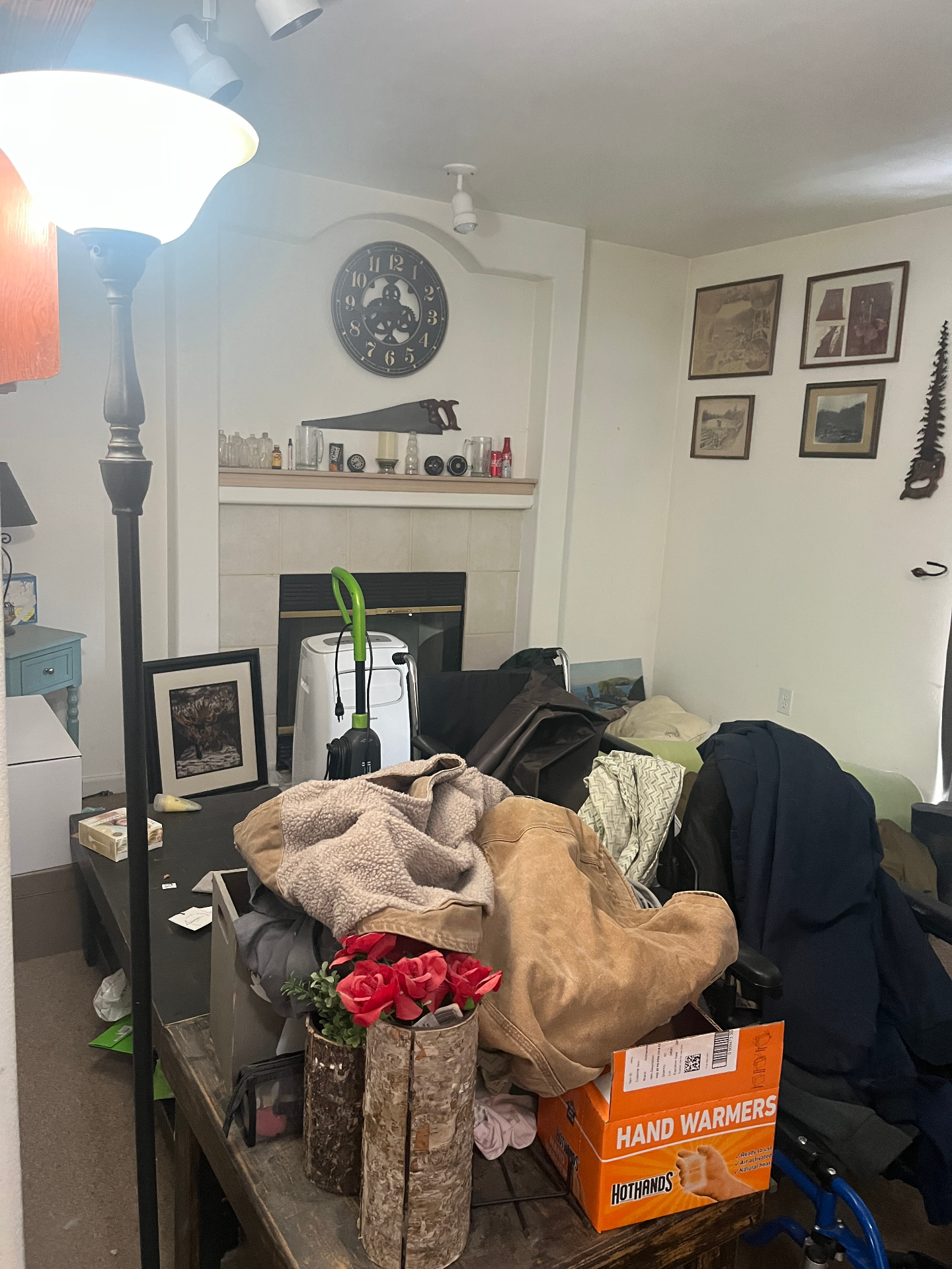 Cluttered living room before strategic clean-out